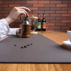 The large leather desktop mat makes office games effortless